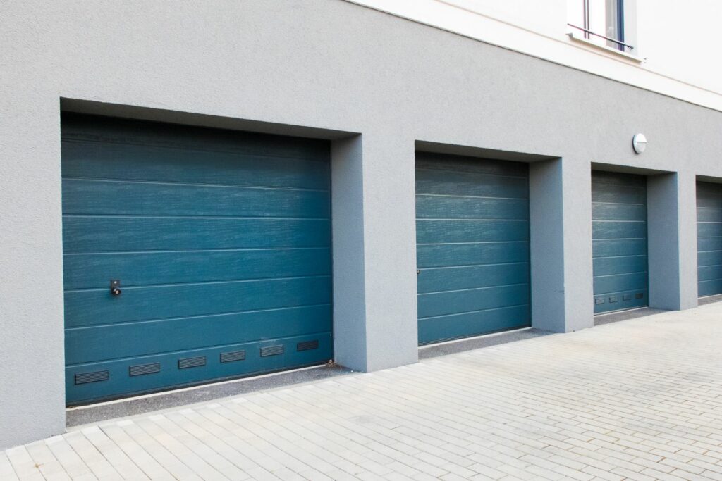 Three commercial garage doors in blue
